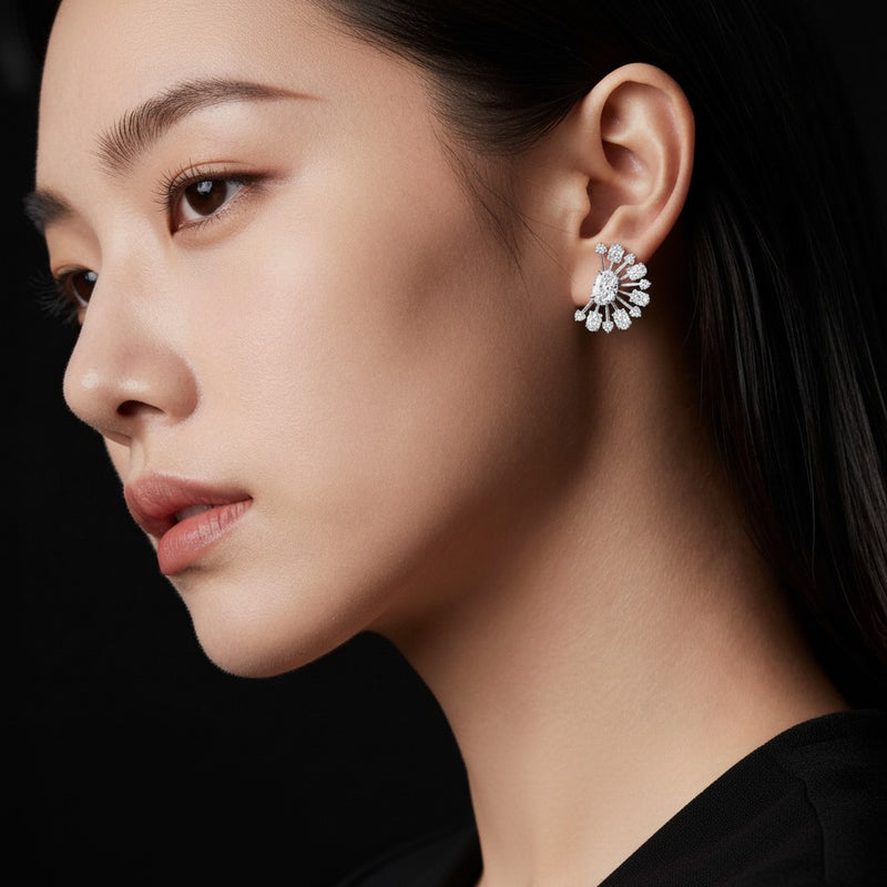Model wearing oval astralis earrings