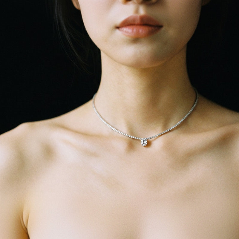Model wearing emerald strata chic collection necklace