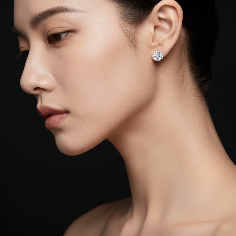 Model wearing round three prong martini stud earrings