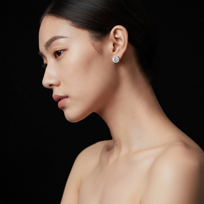 Model wearing round three prong martini stud earrings