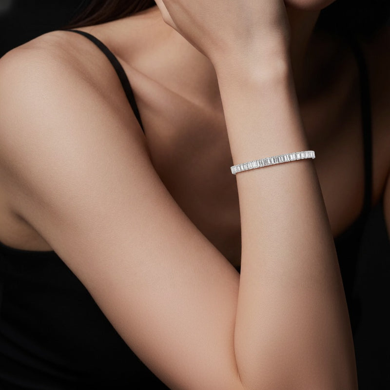 Model wearing emerald east west line bracelet