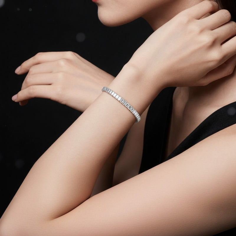 Model wearing emerald lab grown diamond north south bracelet