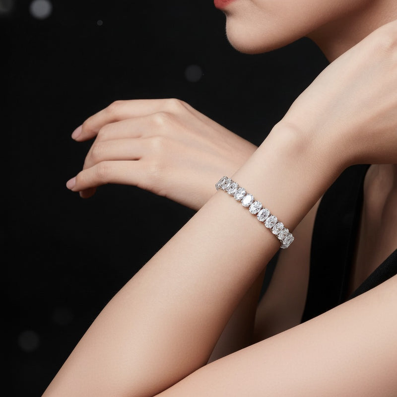 Model wearing oval lab grown diamond north south bracelet