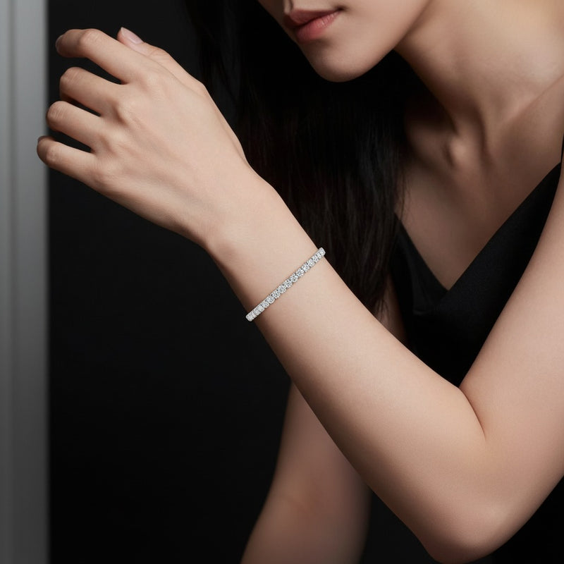 Model wearing round lab grown diamond tennis bracelet