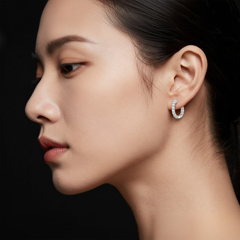 Model wearing round lab grown diamond inside out hoop earrings