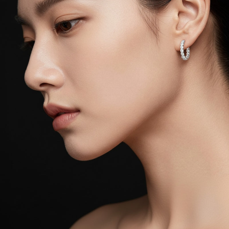 Model wearing round lab grown diamond inside out hoop earrings