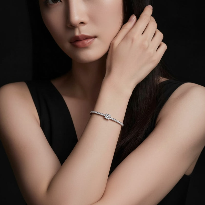 Model wearing emerald lab grown diamond east west bracelet
