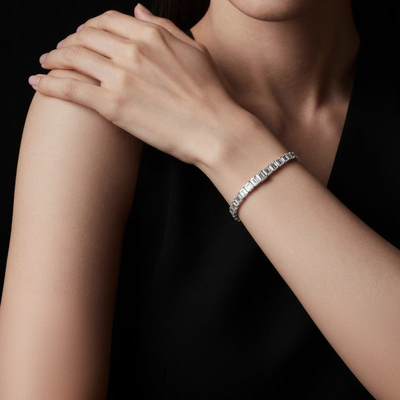 Model wearing emerald lab grown diamond east west bracelet