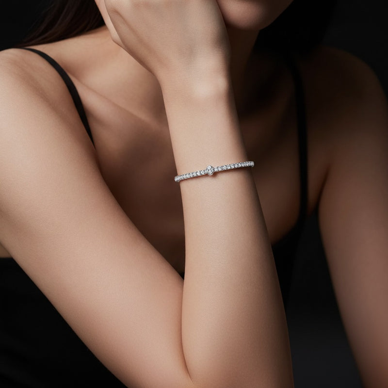Model wearing oval lab grown diamond east west bracelet
