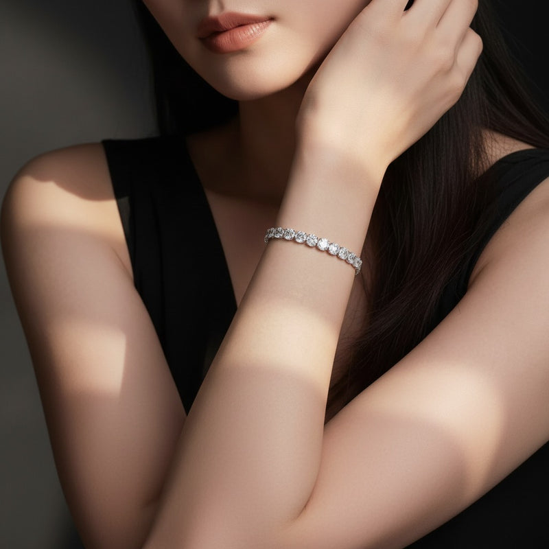 Model wearing oval lab grown diamond east west bracelet