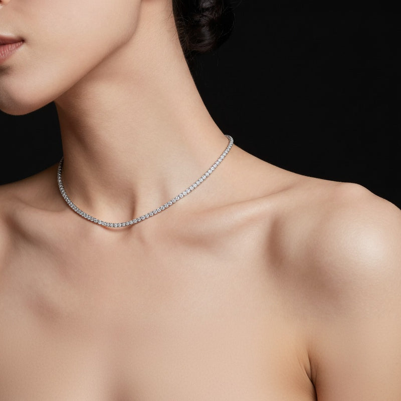 Model wearing oval lab grown diamond tennis necklace