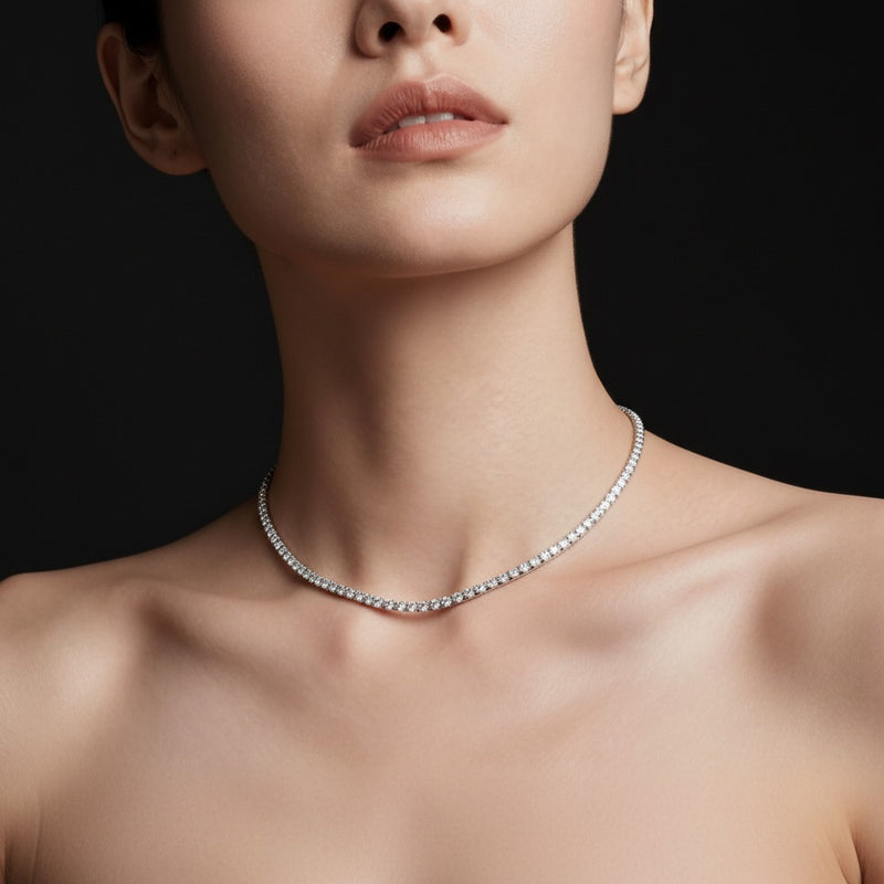 Model wearing oval lab grown diamond tennis necklace