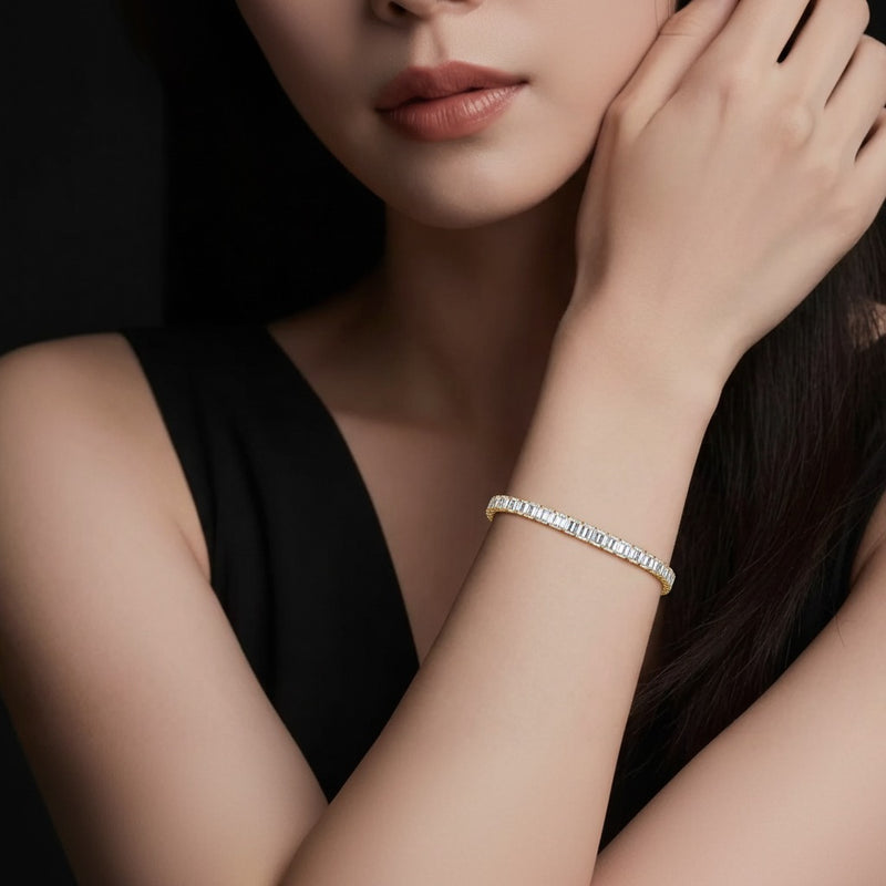 Model wearing emerald east west line bracelet