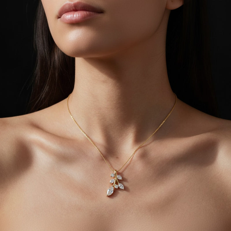 Model wearing marquise leaf motif fashion pendant