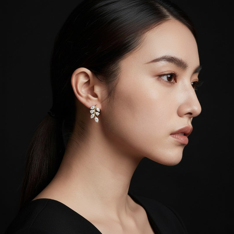Model wearing marquise leaf motif fashion earrings