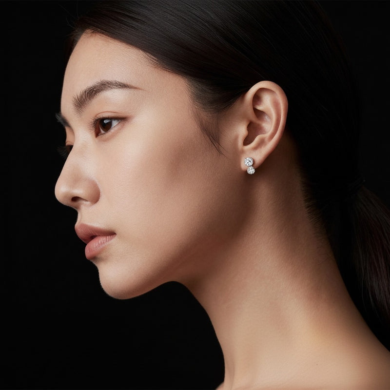 Model wearing round lab grown diamond 4 prong stud earrings