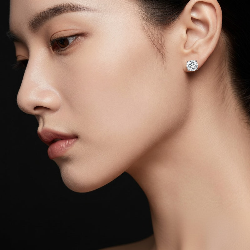 Model wearing round stud earrings
