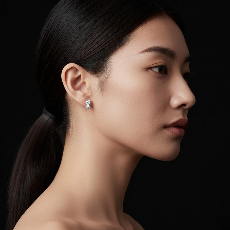 Model wearing round stud earrings