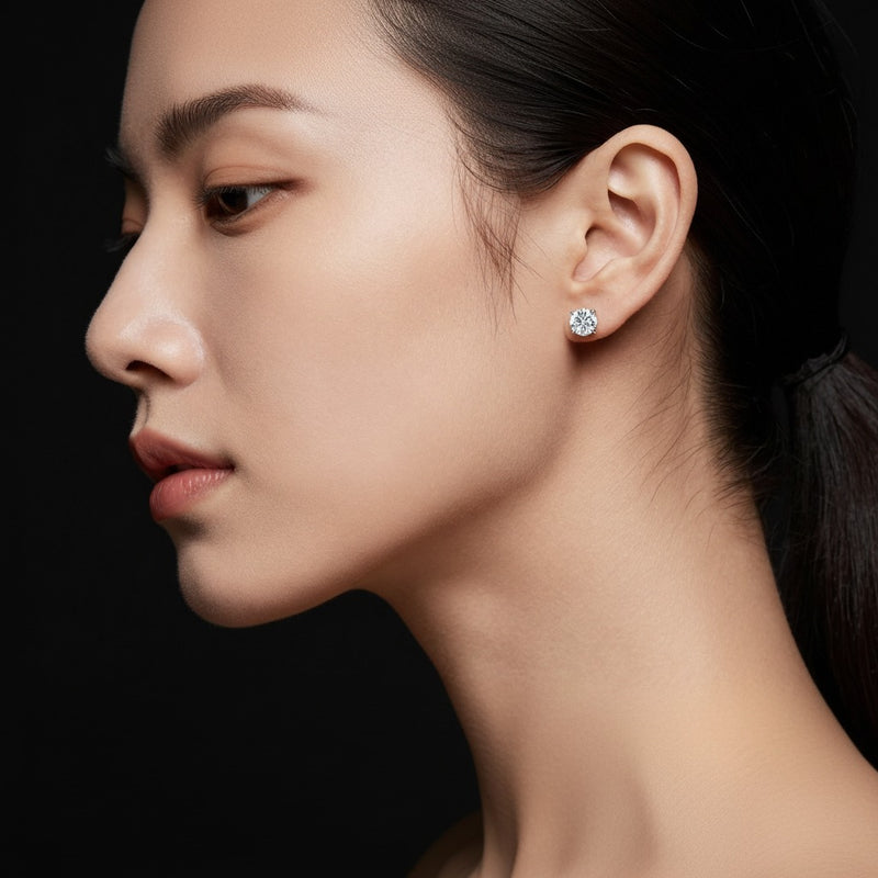 Model wearing round lab grown diamond 4 prong stud earrings