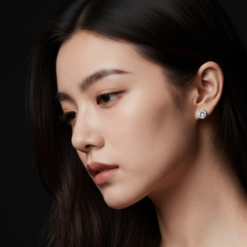 Model wearing round stud earrings