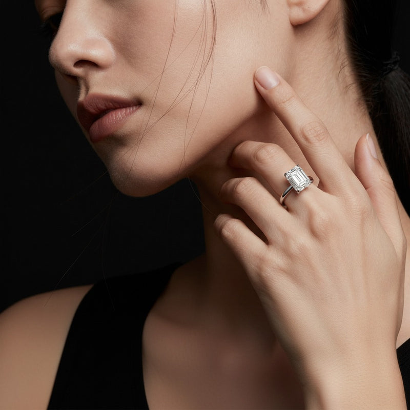 Model wearing emerald lab grown diamond classic solitaire ring