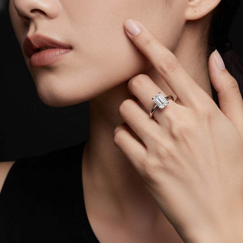 Model wearing emerald lab grown diamond classic solitaire ring