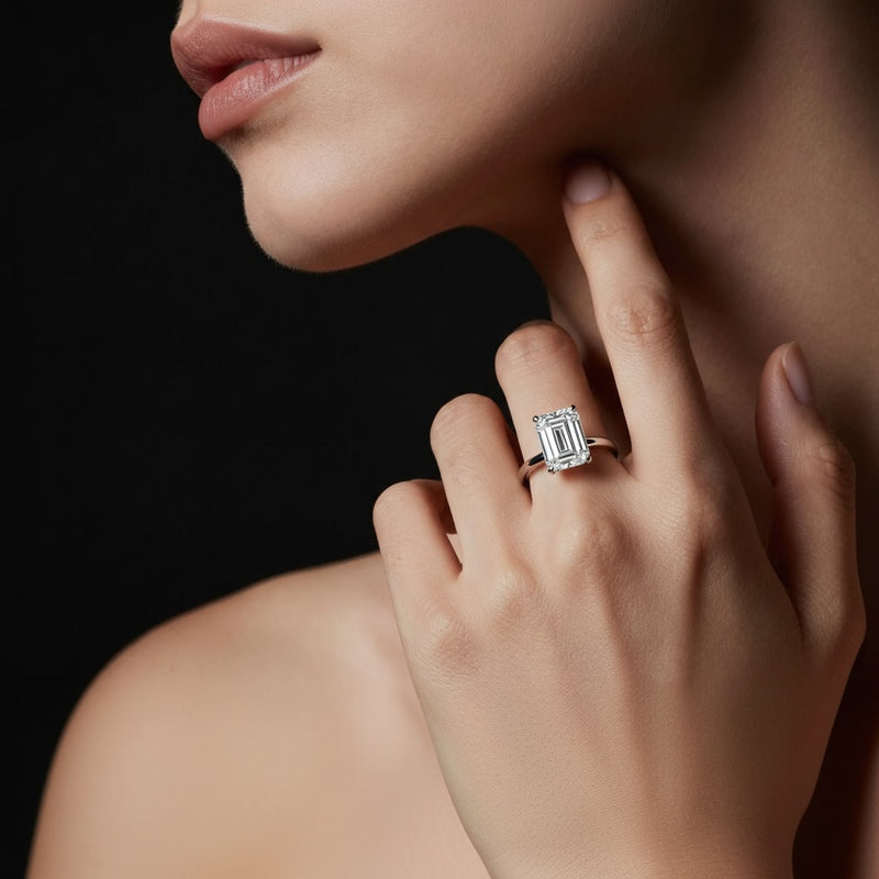 Model wearing emerald lab grown diamond classic solitaire ring