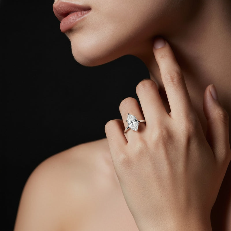 Model wearing marquise lab grown diamond classic solitaire ring