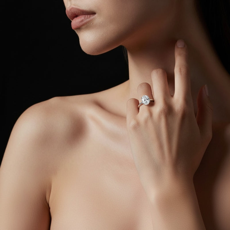 Model wearing pear lab grown diamond classic solitaire ring