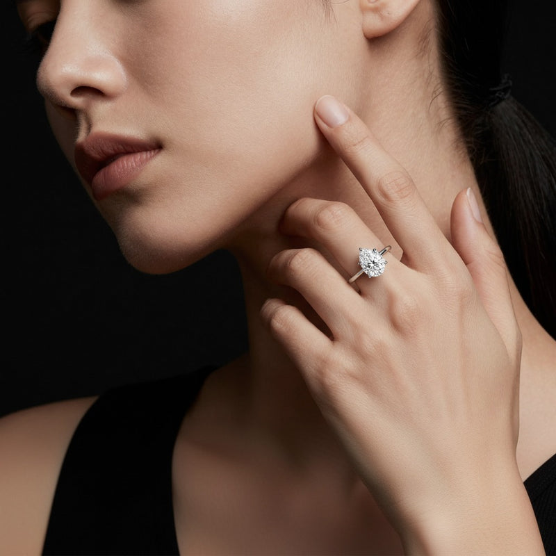 Model wearing pear lab grown diamond classic solitaire ring