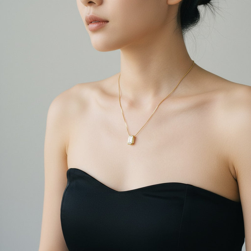 Model wearing radiant bezel set solitaire pendant
