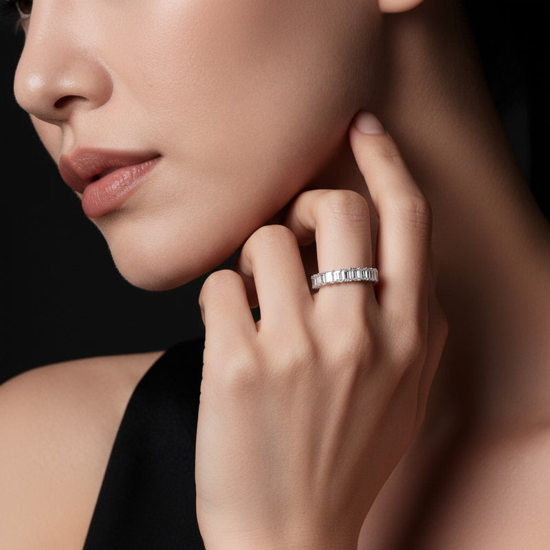 Model wearing emerald lab grown diamond split prong eternity ring