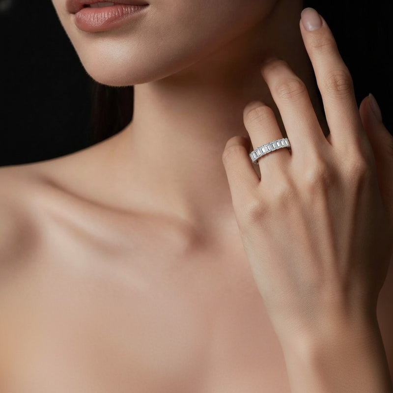 Model wearing emerald lab grown diamond split prong eternity ring