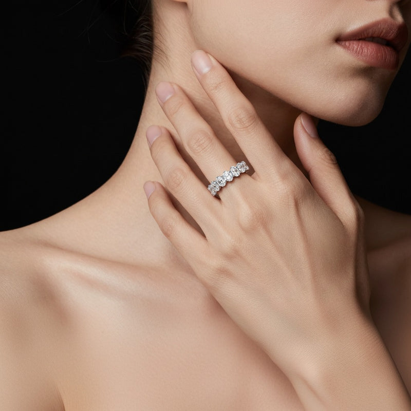 Model wearing oval lab grown diamond split prong eternity ring