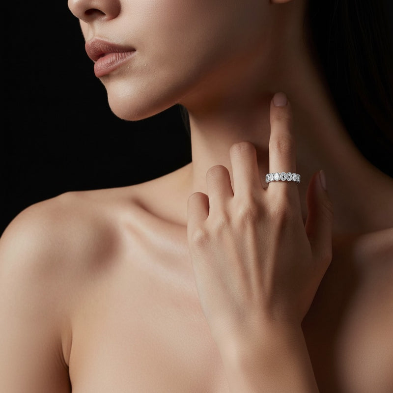 Model wearing oval lab grown diamond split prong eternity ring
