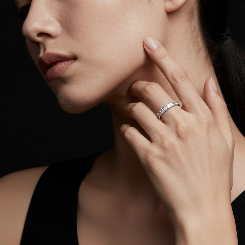 Model wearing emerald lab grown diamond split prong eternity ring