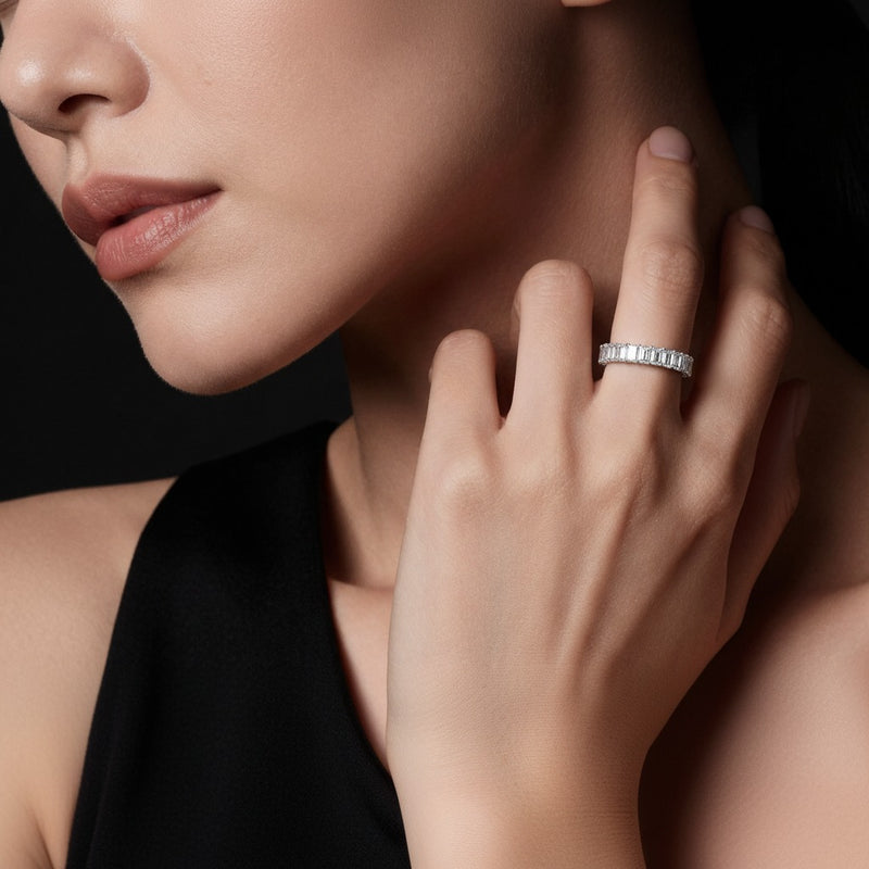Model wearing emerald lab grown diamond split prong eternity ring
