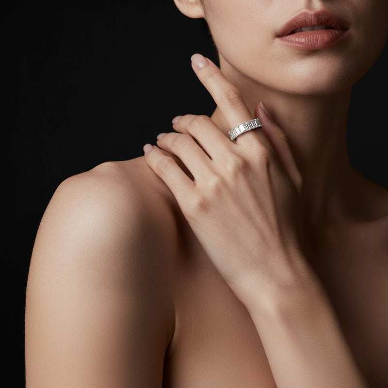 Model wearing emerald lab grown diamond split prong eternity ring