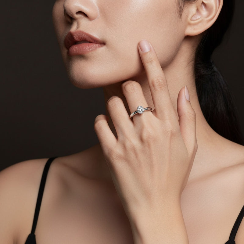 Model wearing oval lab grown diamond split prong eternity ring