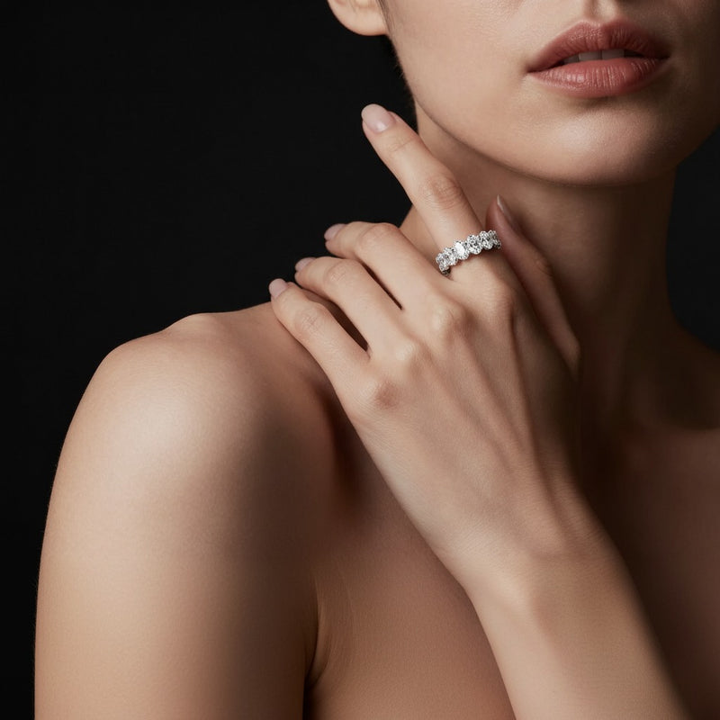 Model wearing oval lab grown diamond split prong eternity ring
