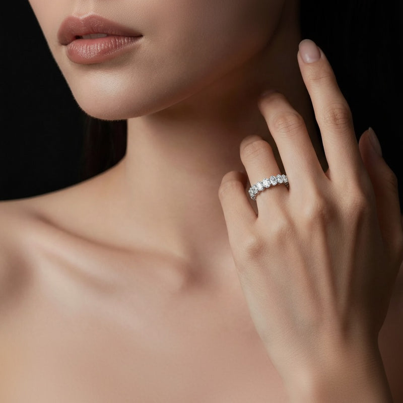 Model wearing oval lab grown diamond split prong eternity ring