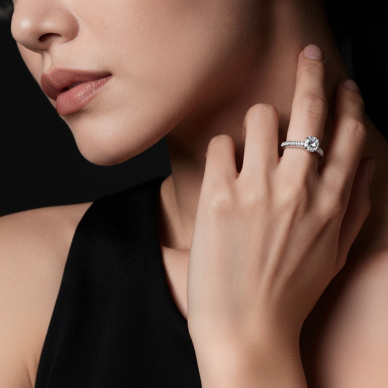 Model wearing round eternity band ring