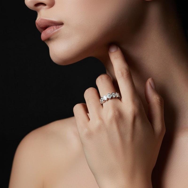 Model wearing oval eternity band ring