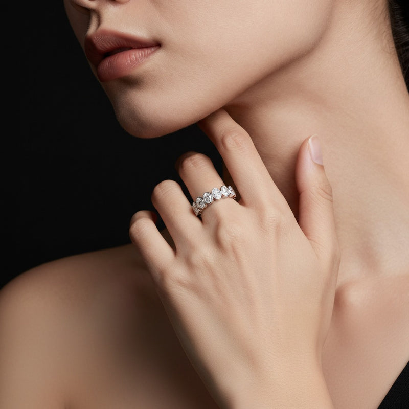 Model wearing oval eternity band ring