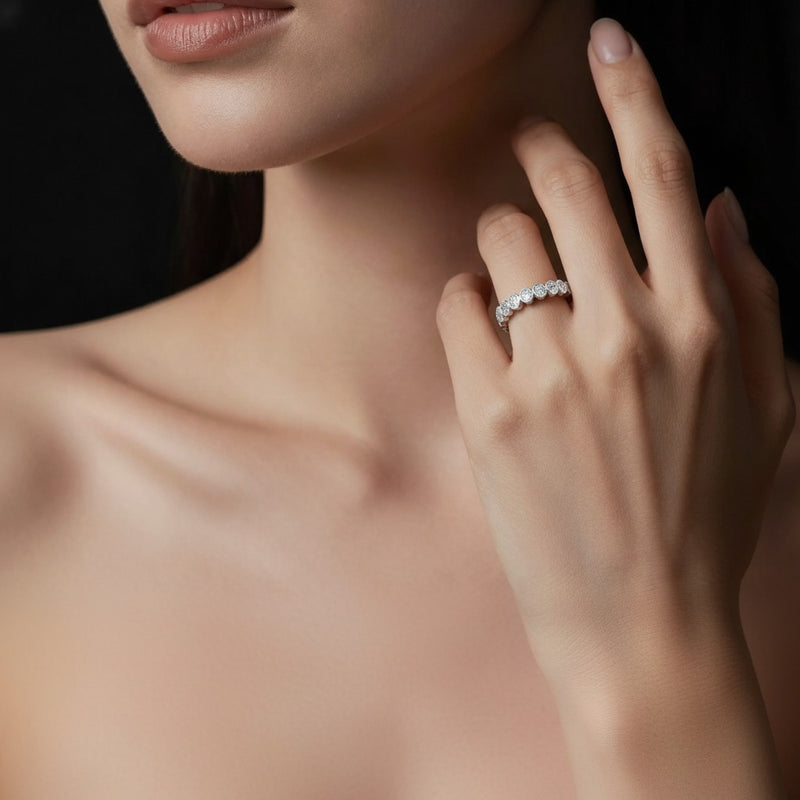 Model wearing oval eternity band ring